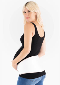 Upsie Belly maternity support belt for pregnant belly to relieve pelvic and back pain. In cream color.