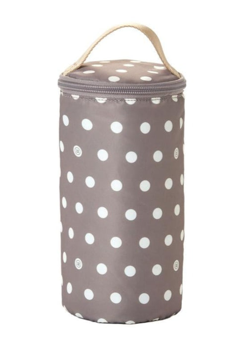 Insulated bottle pouch in white polka dot on gray background with fabric handle on top. 