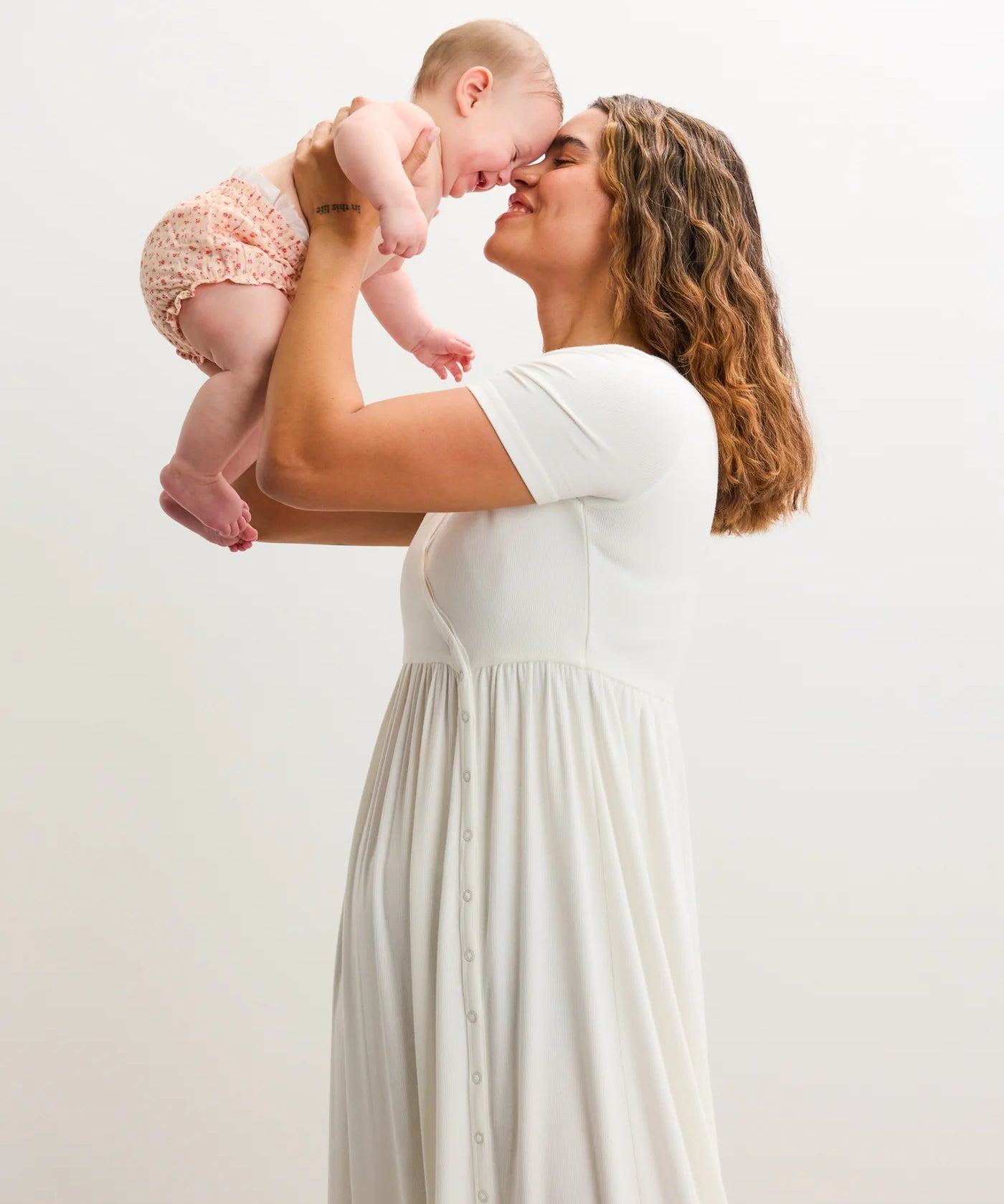 nursing maxi dress Angel Maternity Busy Mama in Dark Navy Stripes seamlessly placed as bust darts Seraphine Smocked Maternity-To-Nursing Maxi Dress