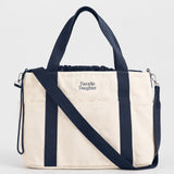Front view of Favorite Daughter The Morgan Tote in natural midnight.