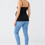 Back view of Ingrid & Isabel Cooling Maternity Layering Cami in black on a pregnant model.