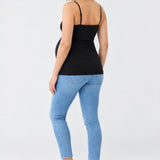 Back view of Ingrid & Isabel Cooling Maternity Layering Cami in black on a pregnant model.