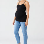 Front view of Ingrid & Isabel Cooling Maternity Layering Cami in black on a pregnant model.