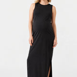 Front view of Ingrid & Isabel The Sidekick Maternity Column Dress in black on a pregnant model.