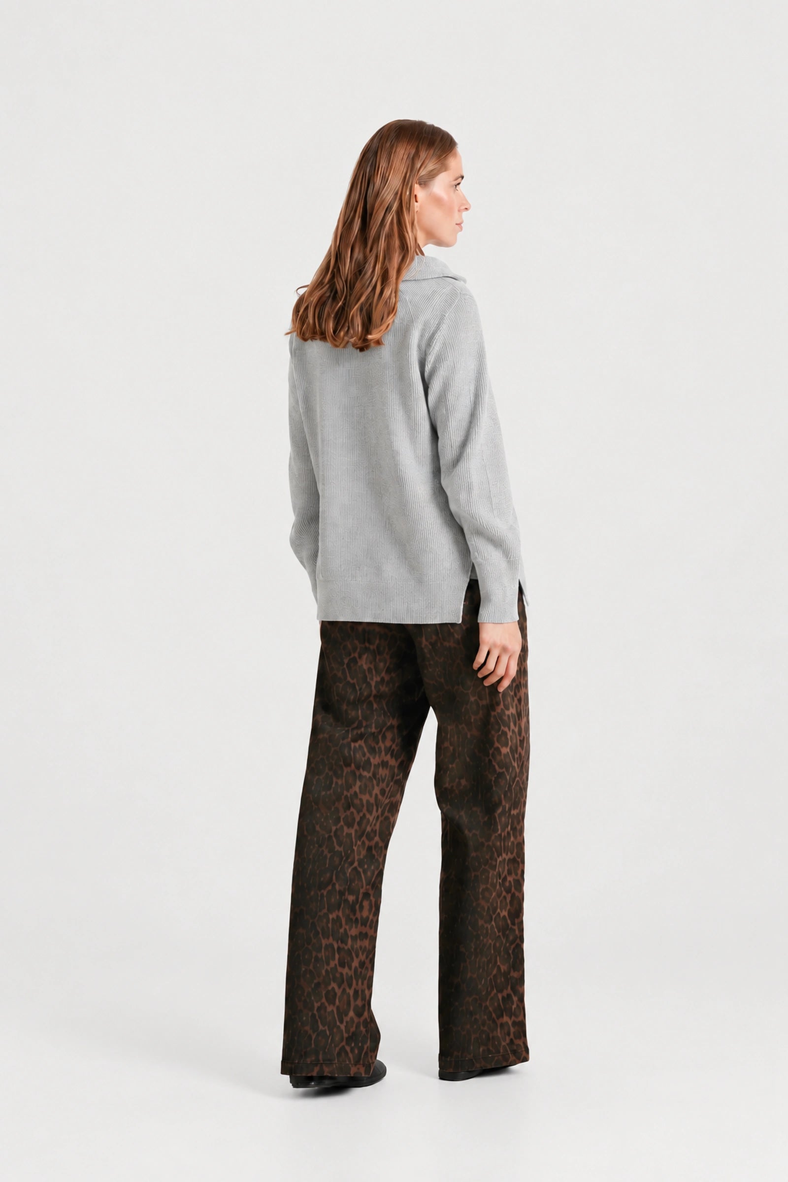 Back view of NOM Slouch Under-Bump Relaxed Jeans — Leopard Print