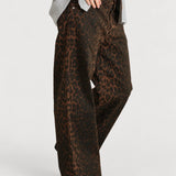 Detail view of NOM Slouch Under-Bump Relaxed Jeans — Leopard Print