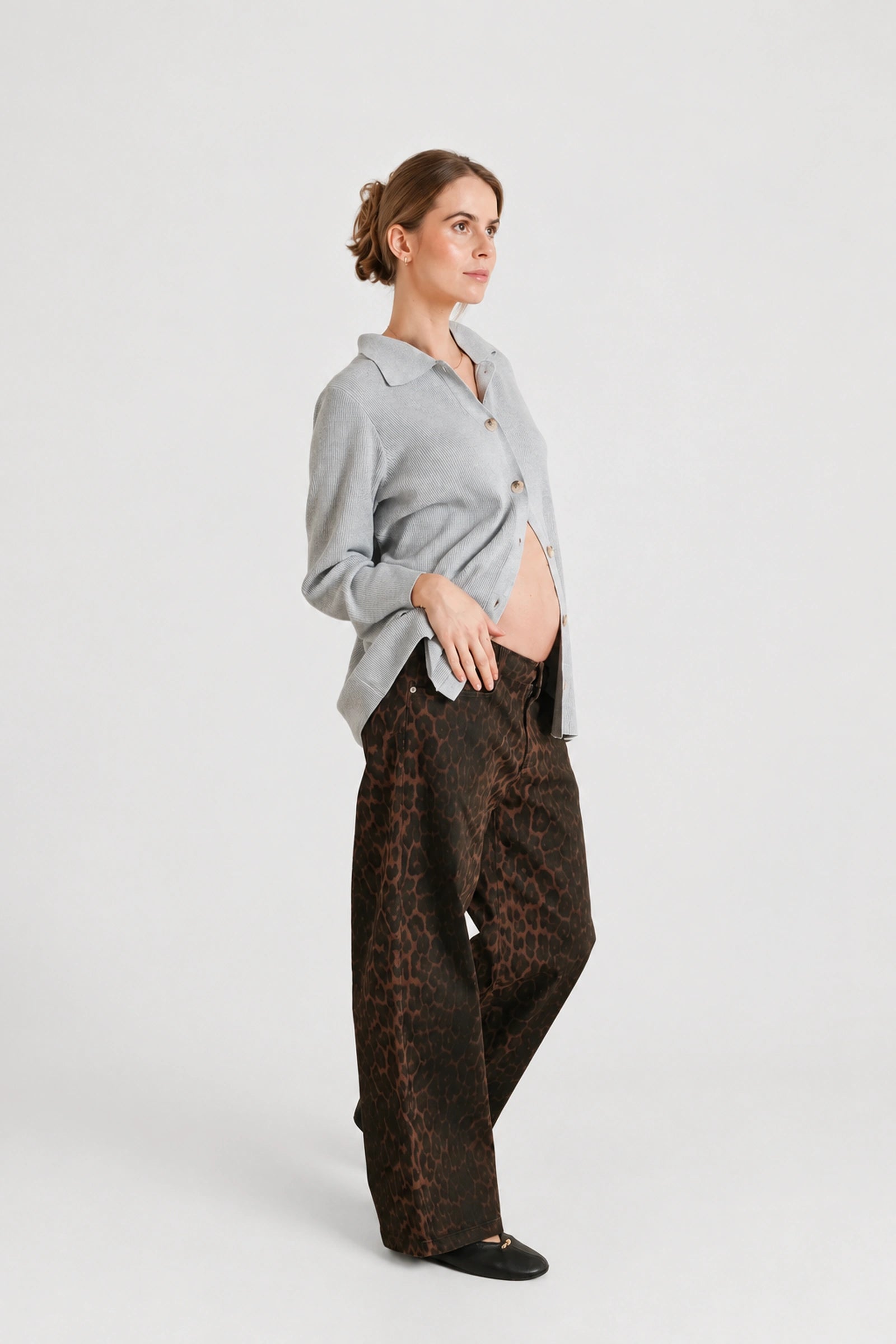 Front view of NOM Slouch Under-Bump Relaxed Jeans — Leopard Print