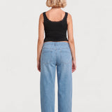 Back view of NOM Slouch Under-Bump Relaxed Jeans — Light Wash