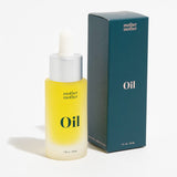 Face and Belly oil with organic ingredients and glass dropper by Mother Mother