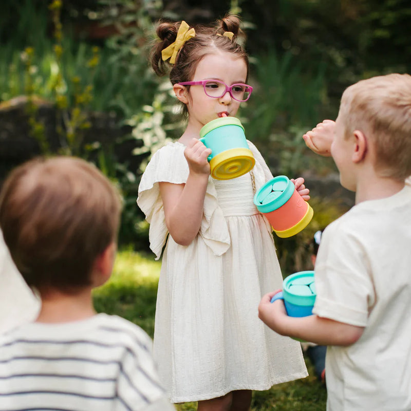 Children drinking from essential sippy cup by morepeas